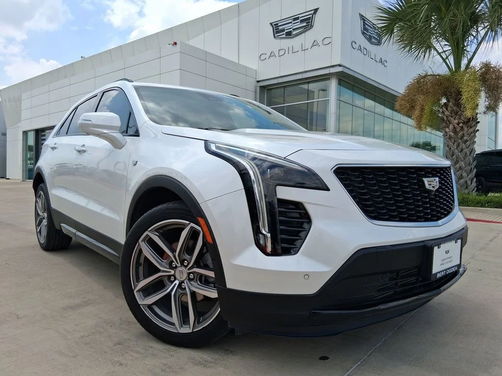 Used 2023 Crystal White Tricoat Cadillac Sport image 1