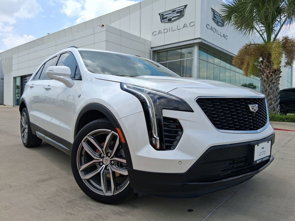 Used 2023 Crystal White Tricoat Cadillac Sport image 1