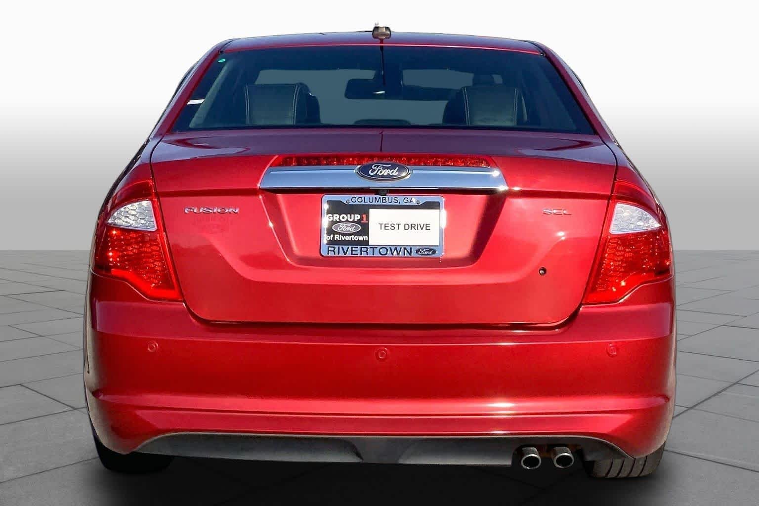 Used 2011 Red Candy Metallic Tinted Ford SEL image 4
