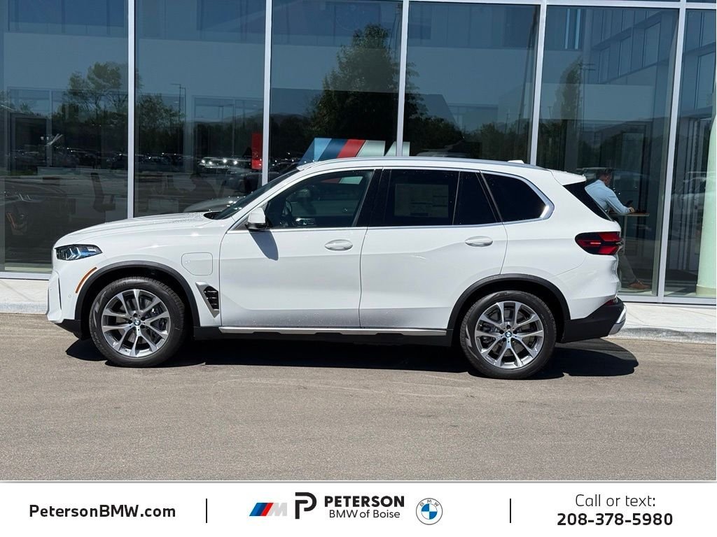 New 2026 Alpine White BMW xDrive50e image 2