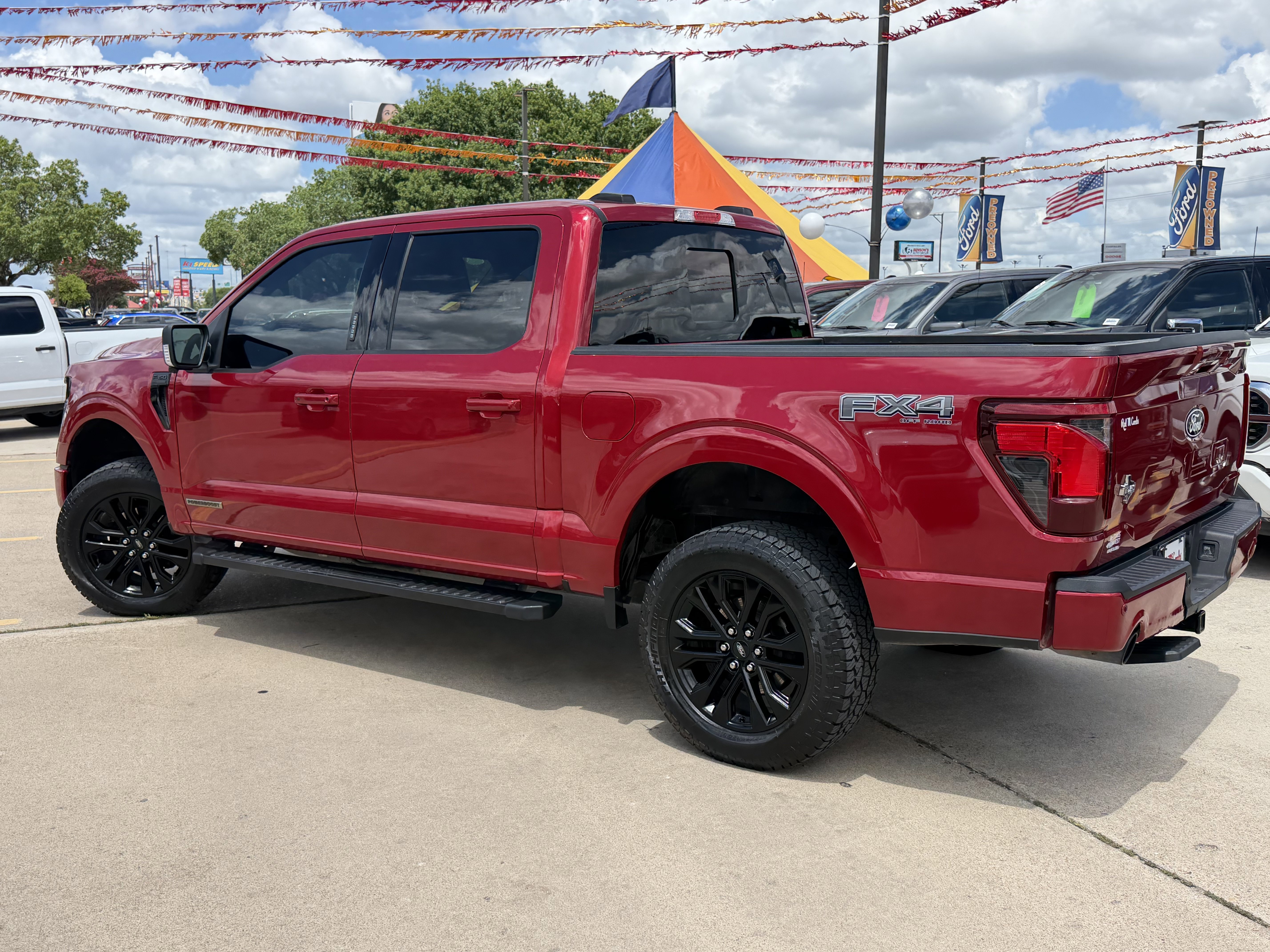 Used 2024 Rapid Red Metallic Tinted Clearcoat Ford XLT image 11