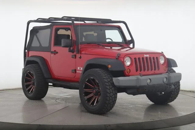 Used 2009 Jeep Wrangler X with VIN 1J4FA24129L761009 for sale in Findlay, OH