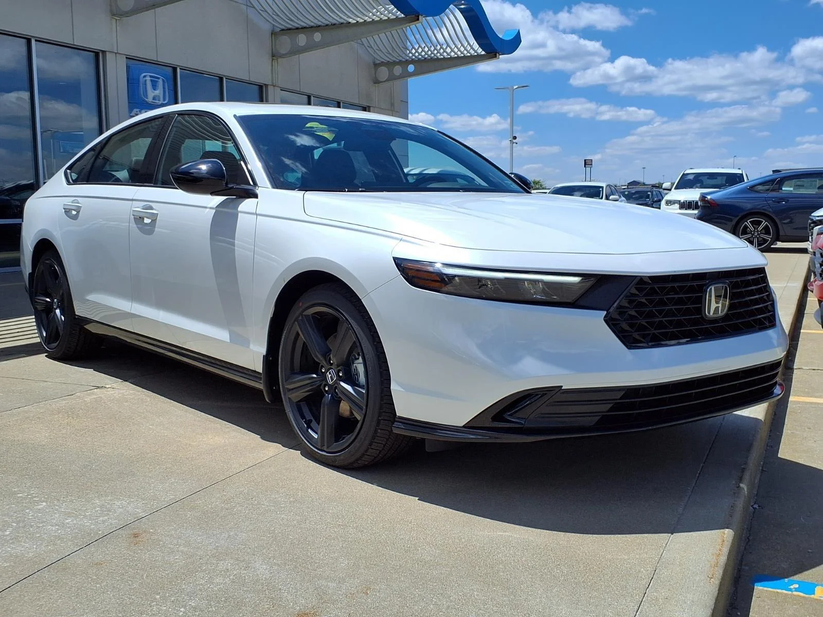 New 2026 Platinum White Pearl Honda Sport-L image 1