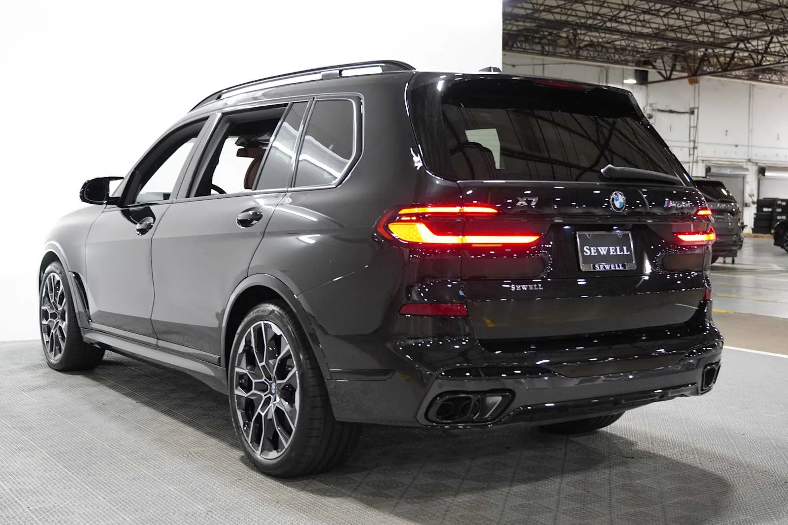 New 2027 Black Sapphire Metallic BMW M60i image 4