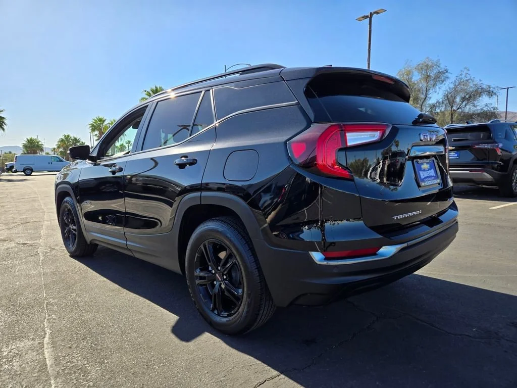 Used 2023 Ebony Twilight Metallic GMC AT4 image 4