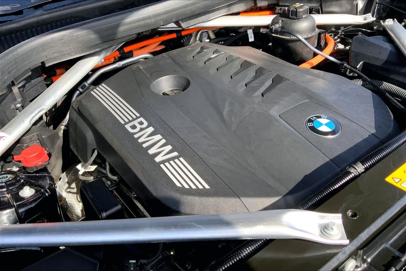 Used 2025 Black Sapphire Metallic BMW xDrive50e image 33
