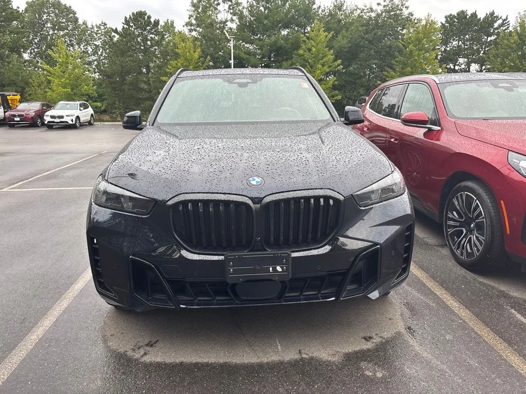 Certified Used 2025 Carbon Black Metallic BMW xDrive40i image 2