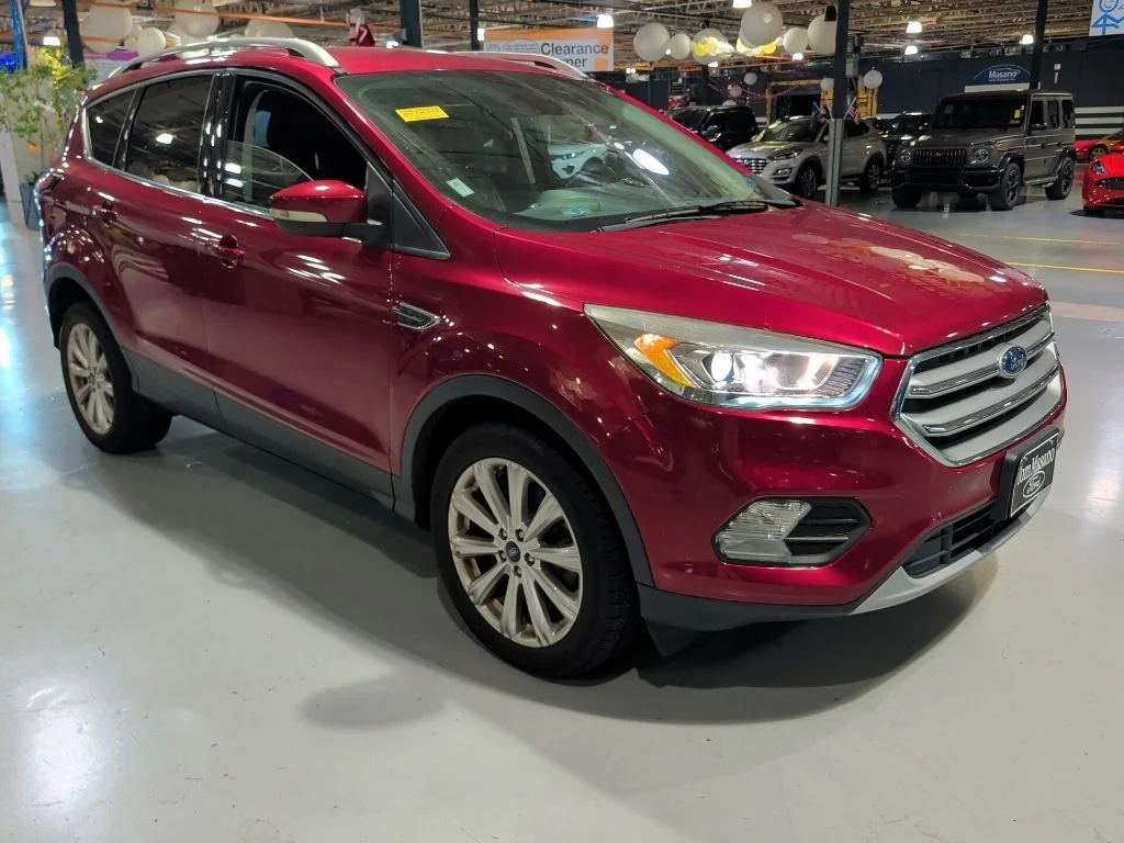 Used 2017 Red Ford Titanium image 1