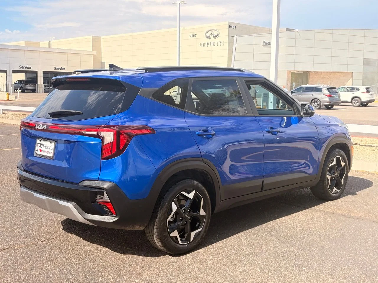 Used 2025 Neptune Blue Kia S image 7