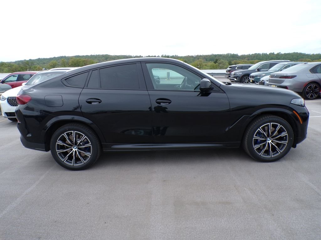 Certified Used 2024 Black Sapphire Metallic BMW M60i image 7