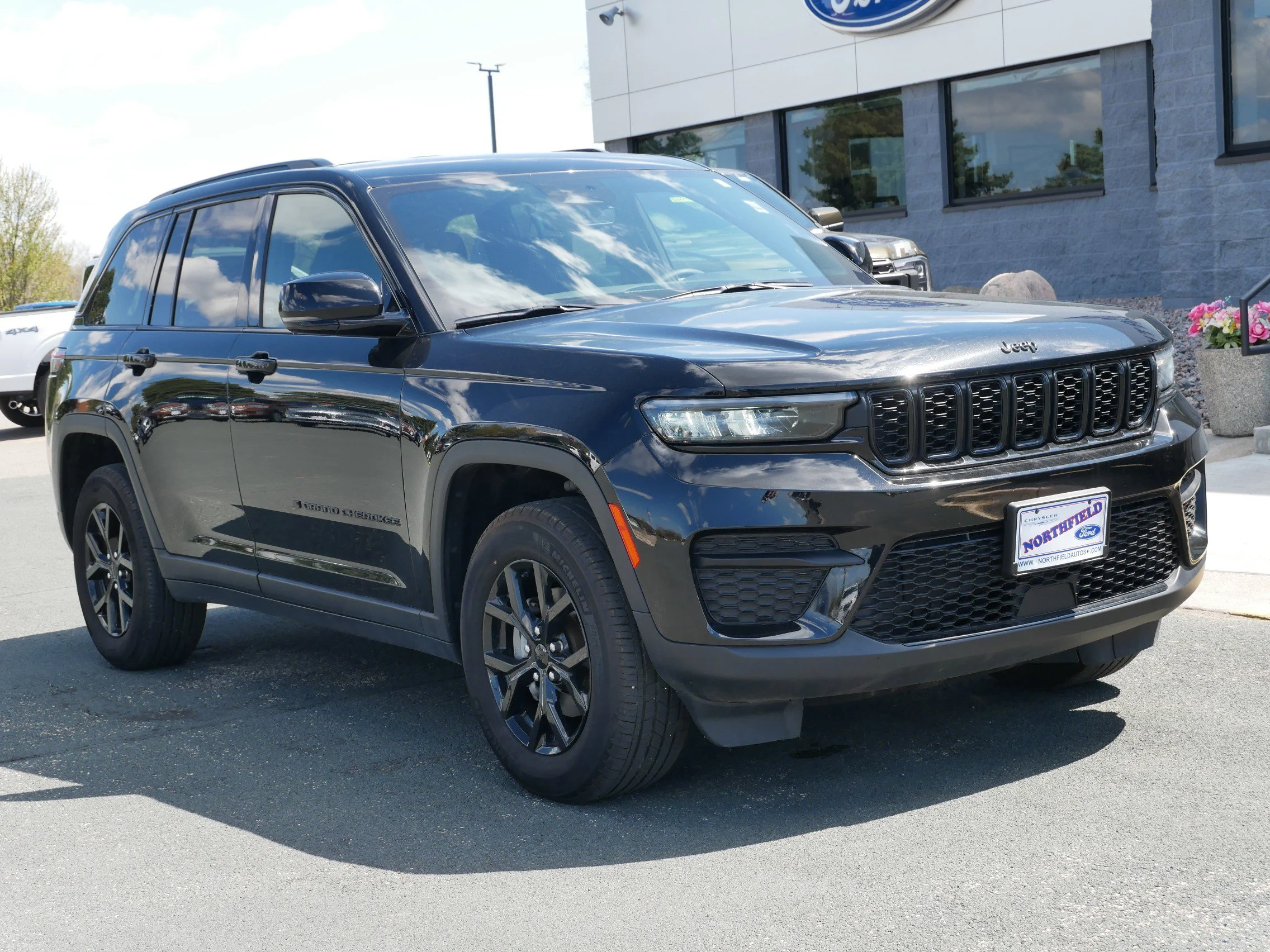 Used 2024 Jeep Grand Cherokee Altitude with VIN 1C4RJHAG4RC108647 for sale in Northfield, Minnesota