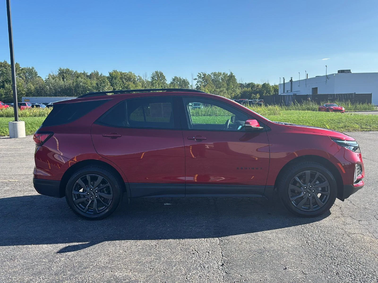 Used 2024 Radiant Red Tintcoat Chevrolet RS image 8
