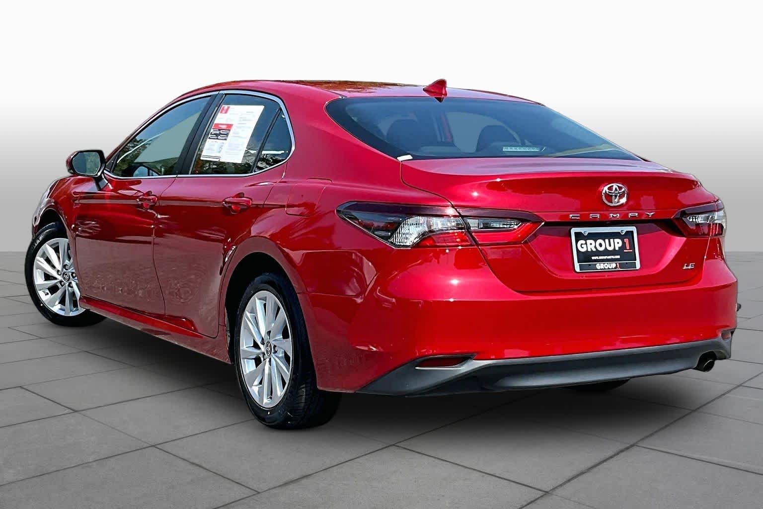 Used 2023 Supersonic Red Toyota LE image 12
