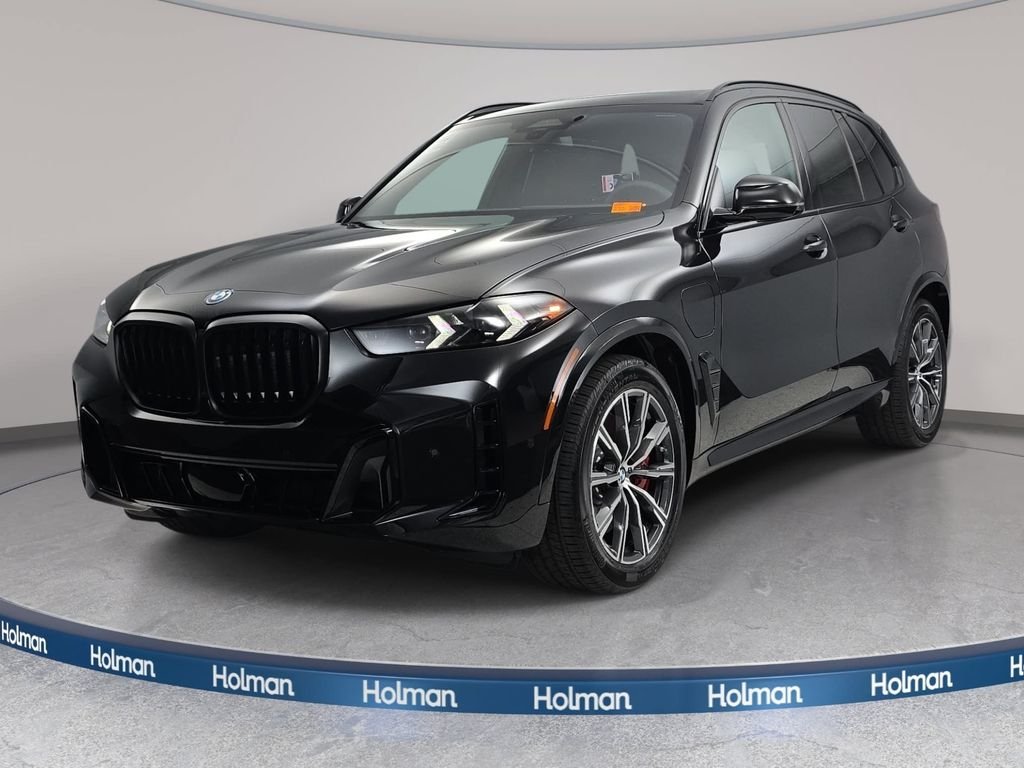 New 2026 Black Sapphire Metallic BMW xDrive50e image 1