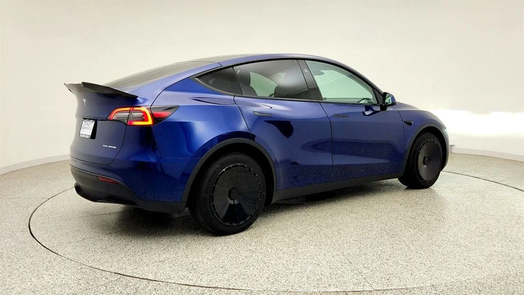 Used 2024 Deep Blue Metallic Tesla Long Range AWD w/ Full Self-Driving & Aero Disc Wheel Covers image 5