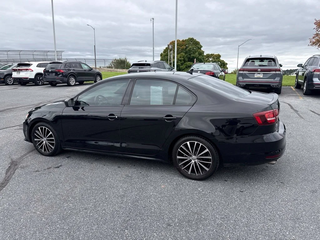 Used 2016 Black Uni Volkswagen 1.8T Sport image 9