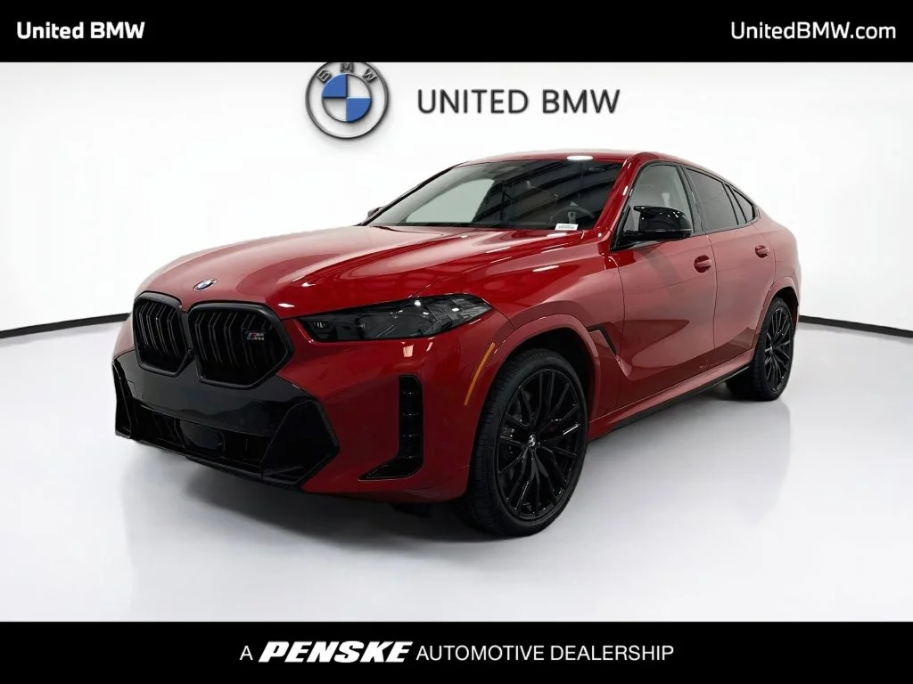 New 2026 Melbourne Red Metallic BMW M60i image 1