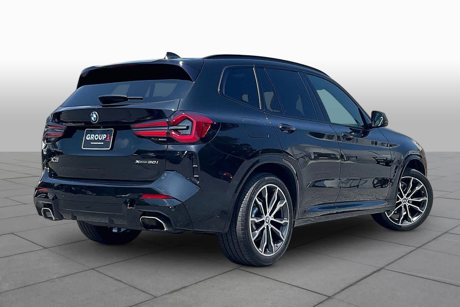 Used 2022 Black Sapphire Metallic BMW xDrive30i image 12