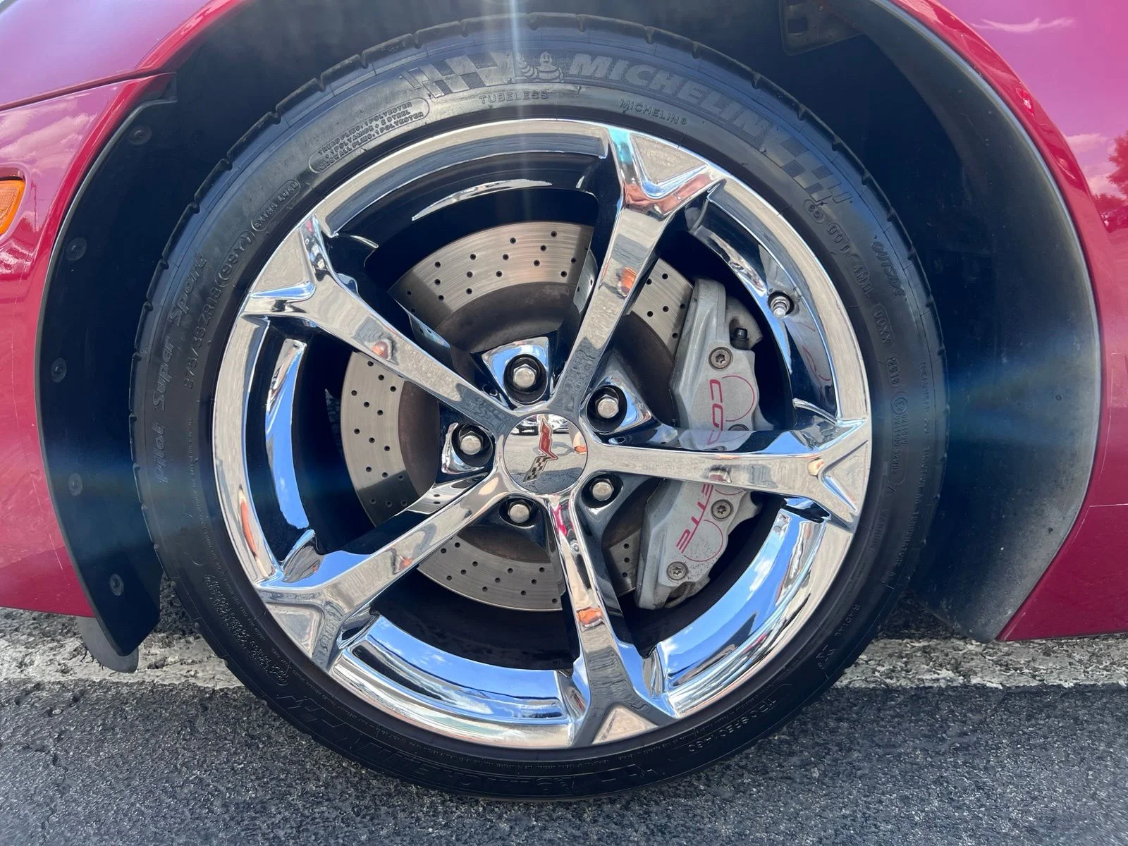 Used 2012 Crystal Red Tintcoat Chevrolet Grand Sport image 22