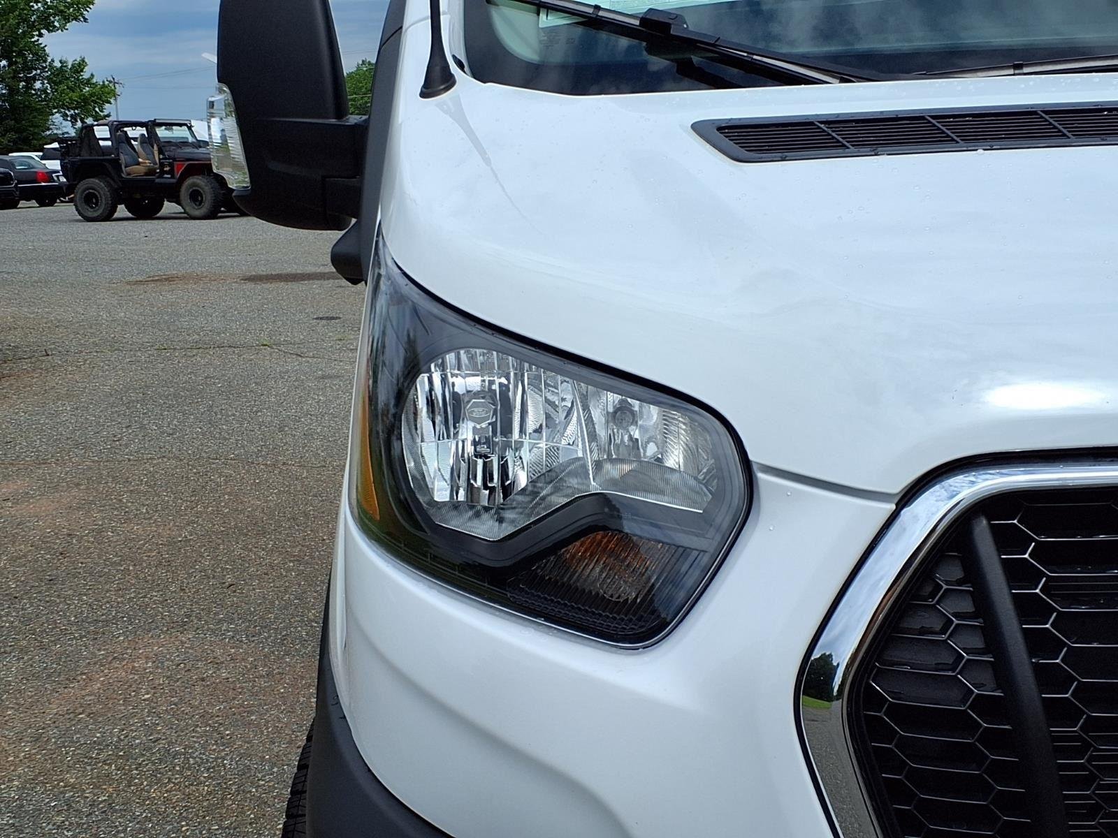 New 2026 Oxford White Ford Passenger Van XL image 14