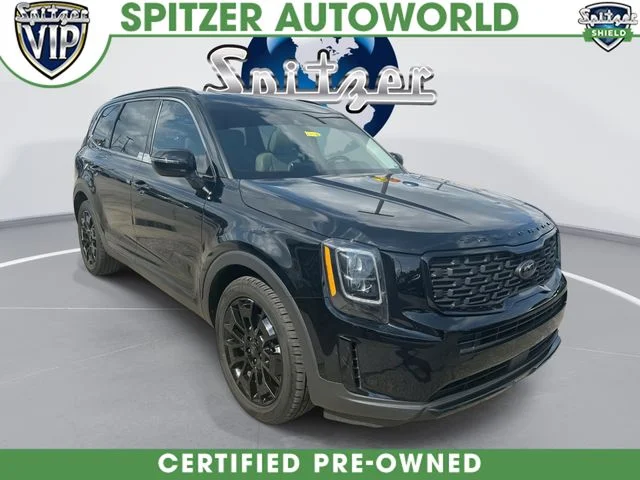 Used 2021 Black Kia EX image 1