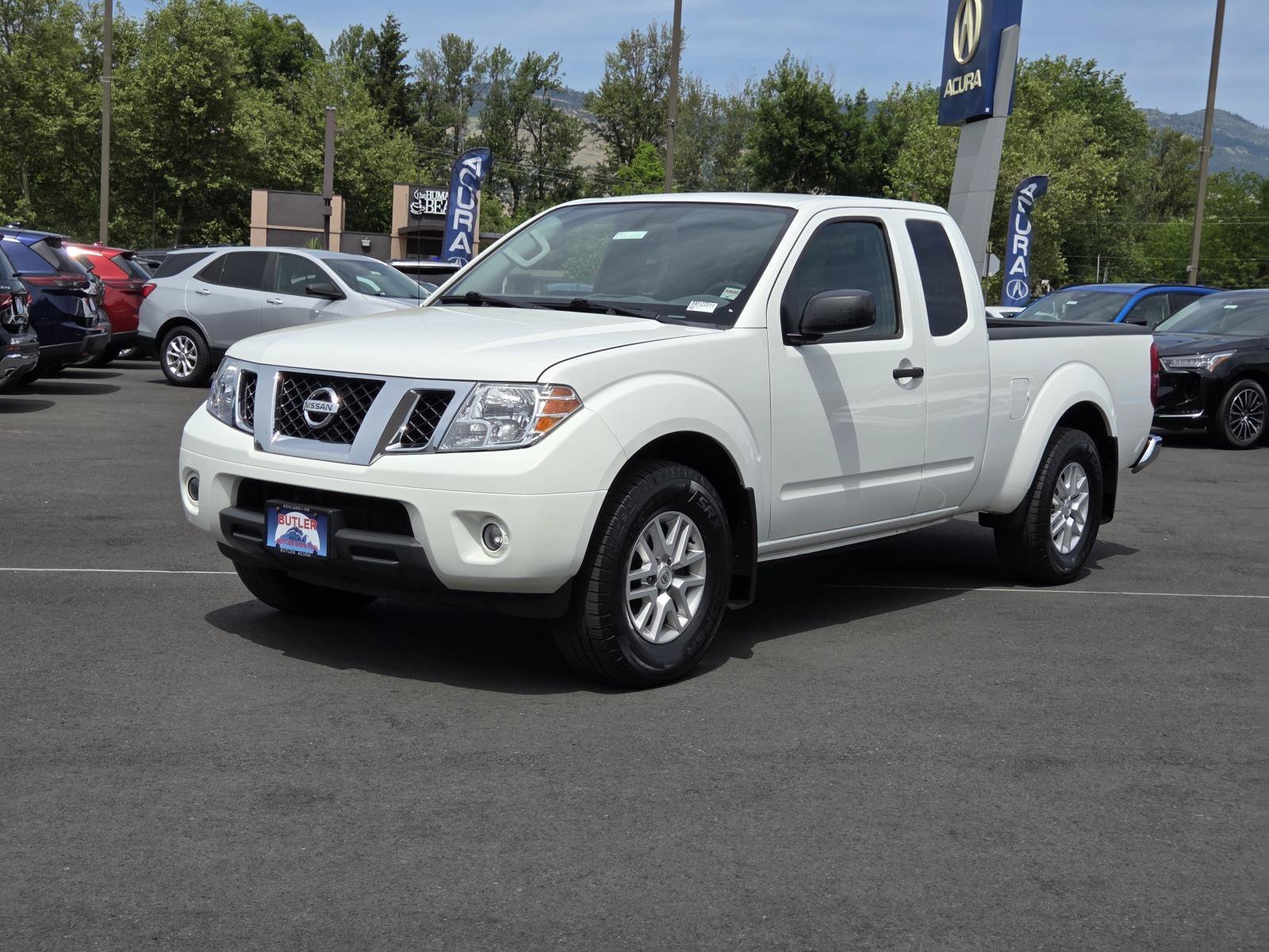 Used 2020 Glacier White Nissan SV image 1