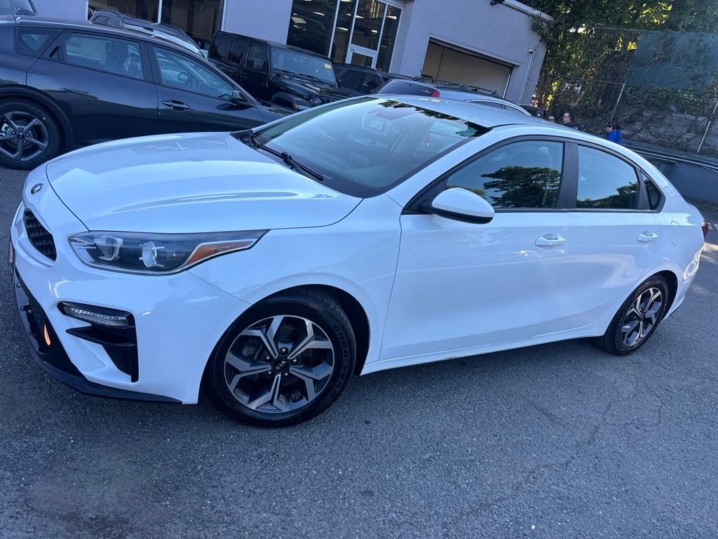 Used 2021 White Kia LXS image 1