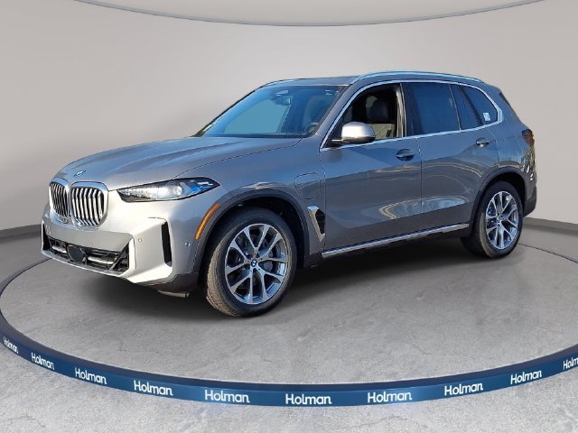 New 2026 Skyscraper Grey Metallic BMW xDrive50e image 1