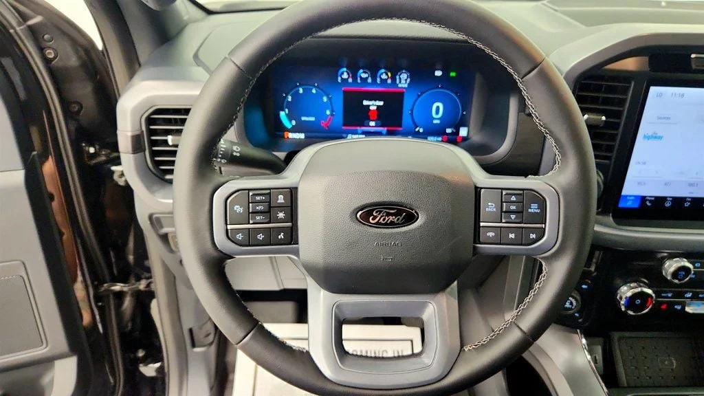 Used 2025 Agate Black Metallic Ford XLT 4WD SuperCrew 5.5