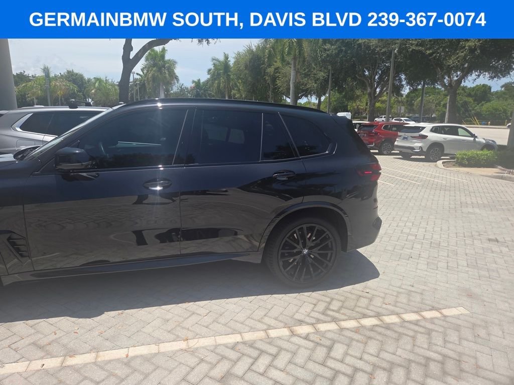 Certified Used 2026 Black Sapphire Metallic BMW sDrive40i image 7