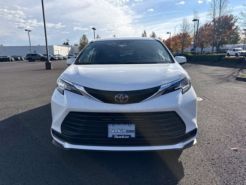 Used 2021 Super White Toyota LE image 2