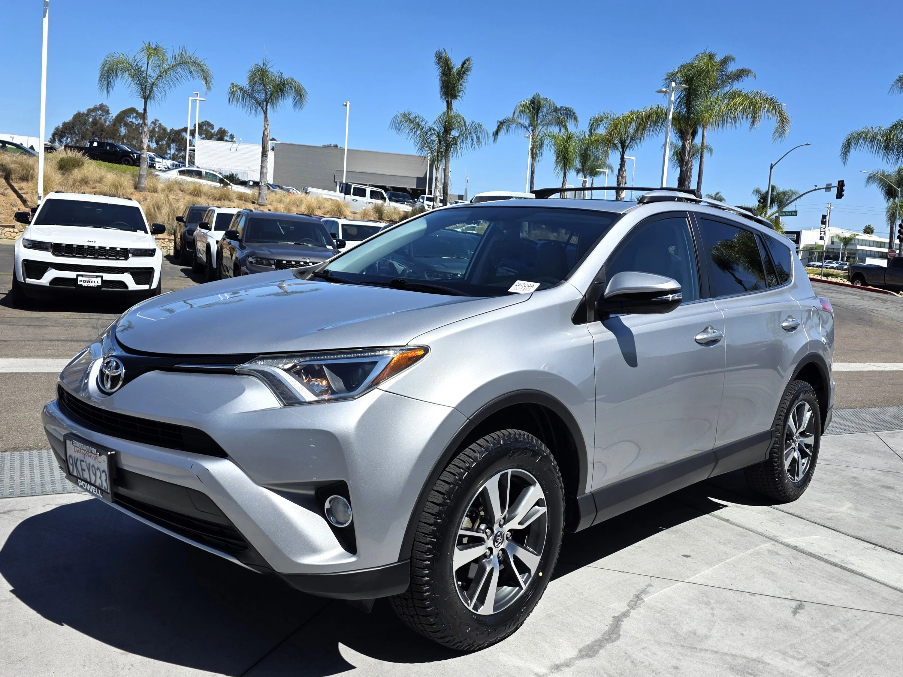 Used 2016 Silver Sky Metallic Toyota XLE image 2