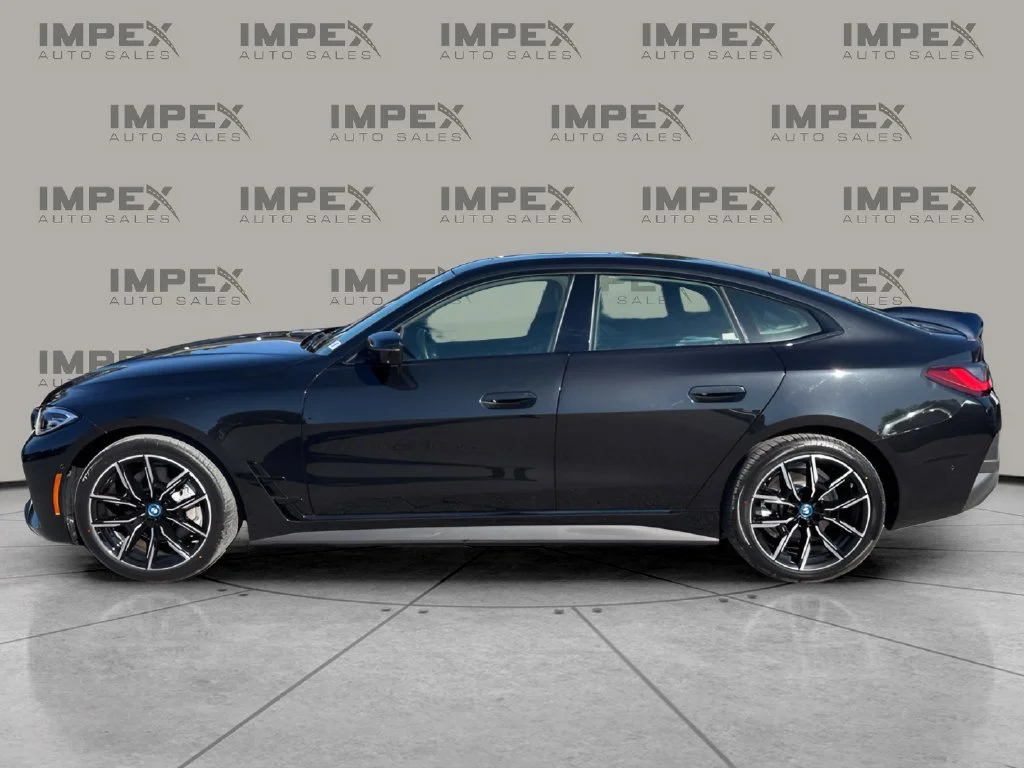 Used 2024 Black BMW eDrive40 image 2