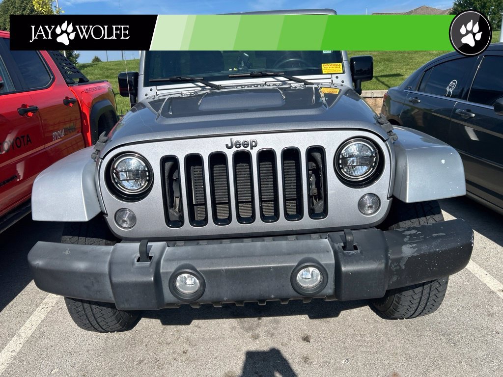Used 2015 Silver Jeep Unlimited Sahara image 2