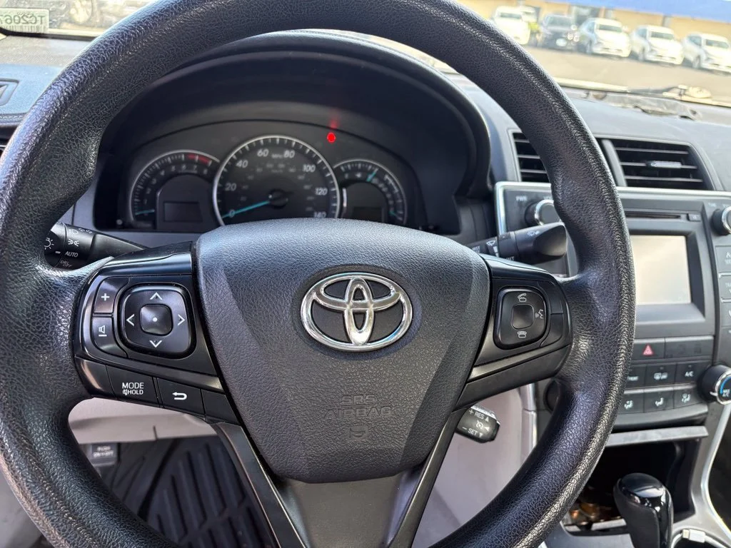 Used 2015 Celestial Silver Metallic Toyota LE image 10