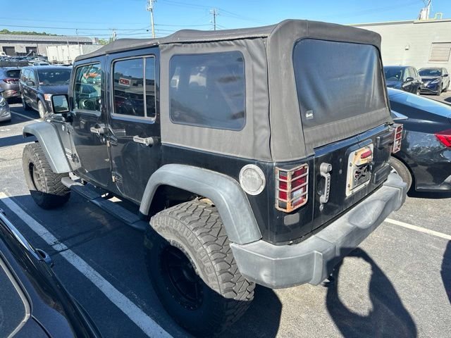 Used 2016 Black Jeep Unlimited Sport image 4