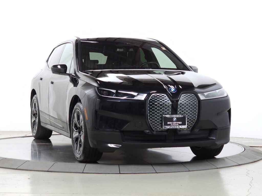 Used 2024 Black Sapphire Metallic BMW xDrive50 image 1