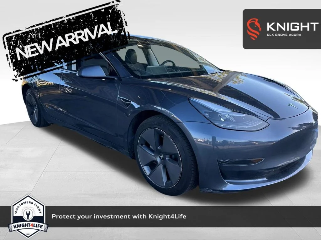 Used 2023 Midnight Silver Metallic Tesla Base image 1