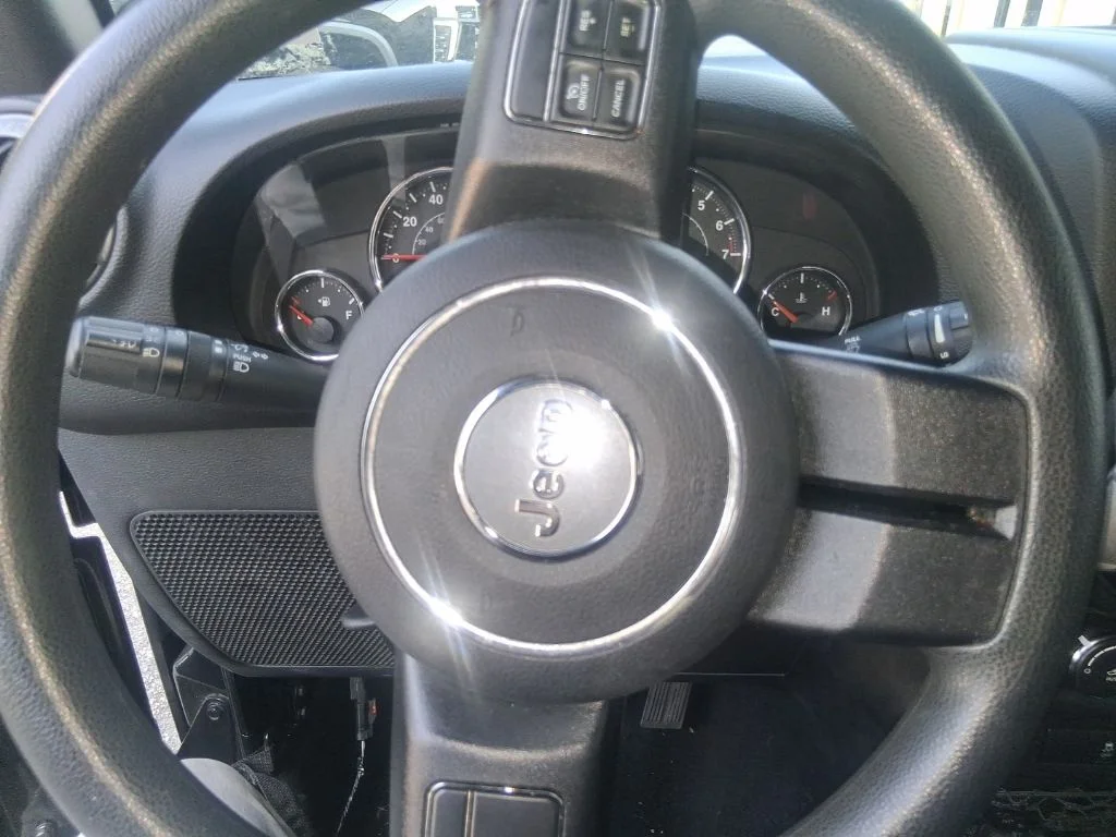 Used 2013 Black Jeep Sport image 10