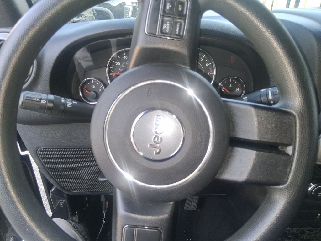 Used 2013 Black Jeep Sport image 10