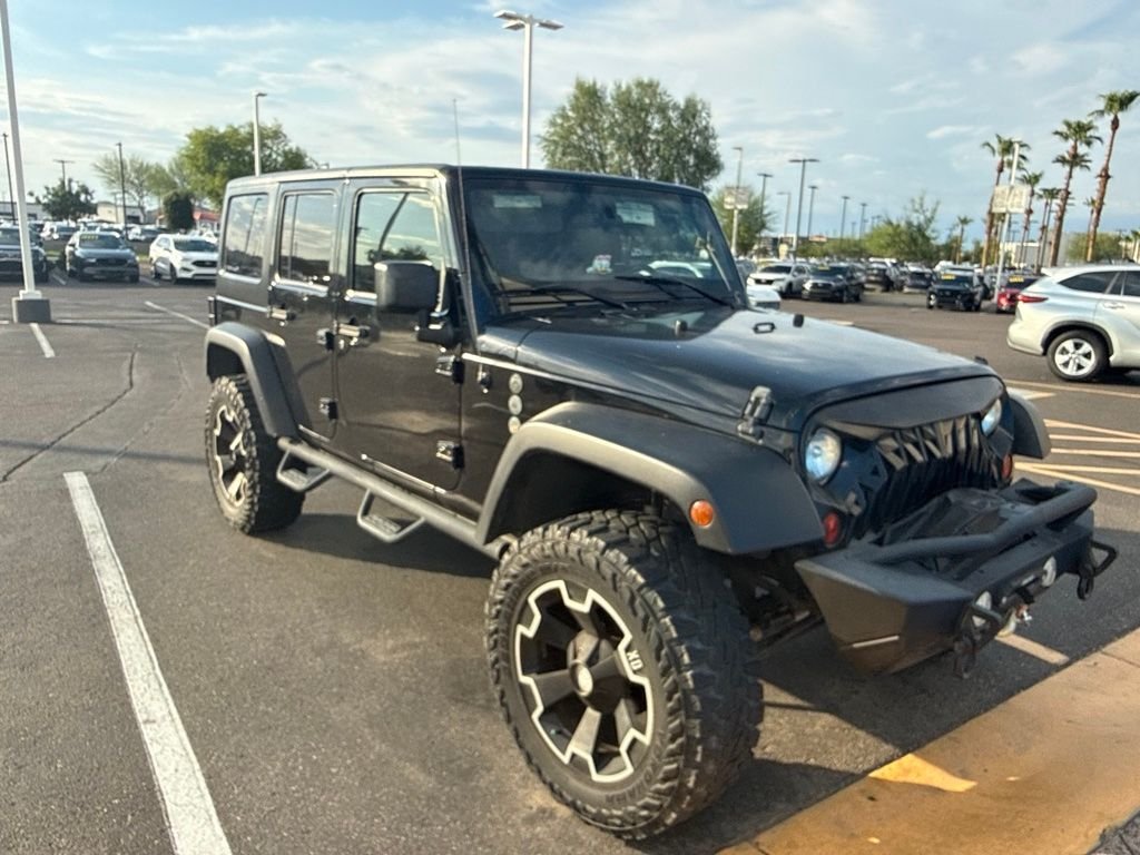 Used 2011 Black ClearCoat Jeep Unlimited Rubicon image 4
