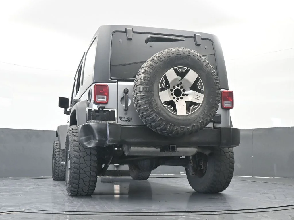 Used 2016 Billet Silver Metallic Clearcoat Jeep Unlimited Sport image 58