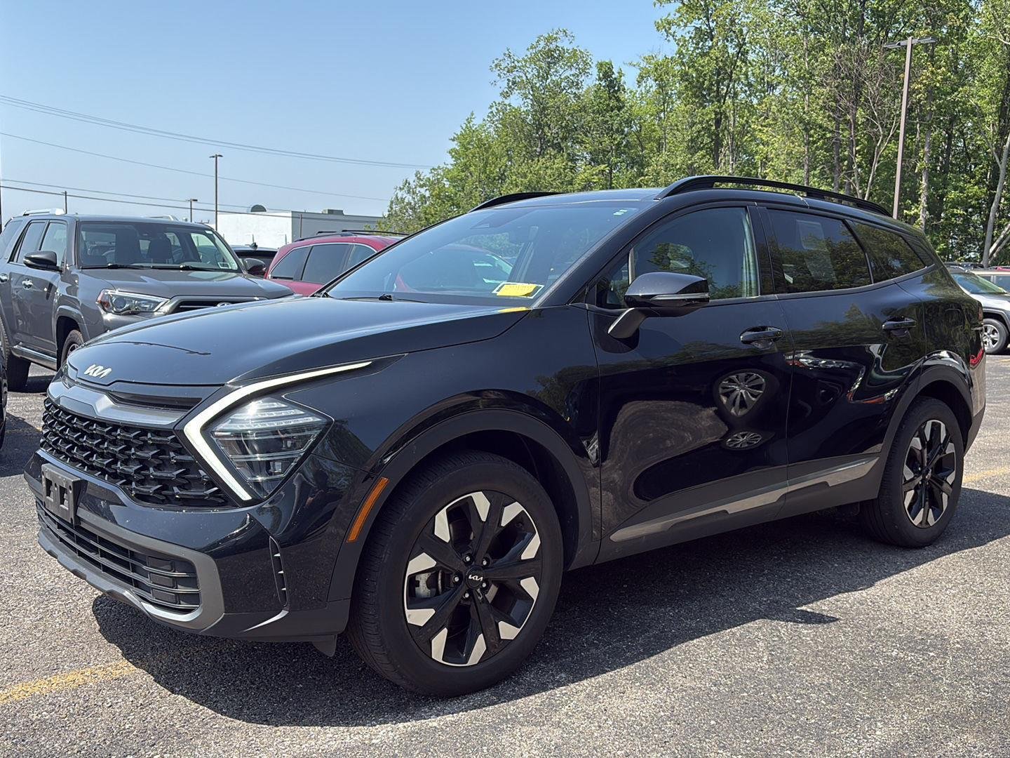 Used 2024 Ebony Black Kia X-Line image 16