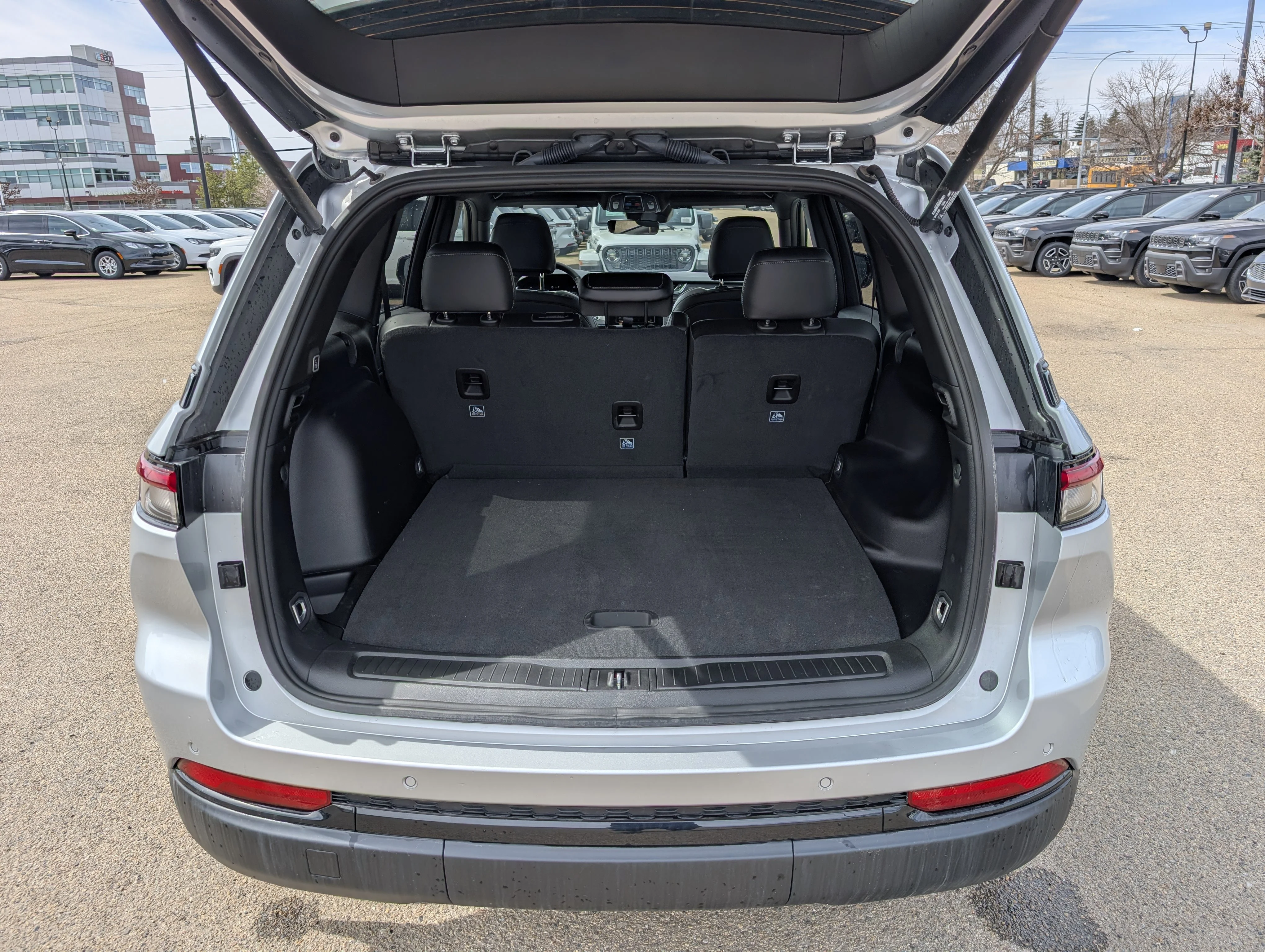 New 2025 Silver Zynith Jeep Altitude image 6