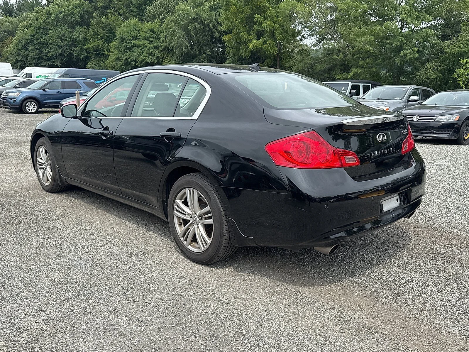 Used 2012 Black Obsidian INFINITI x image 4