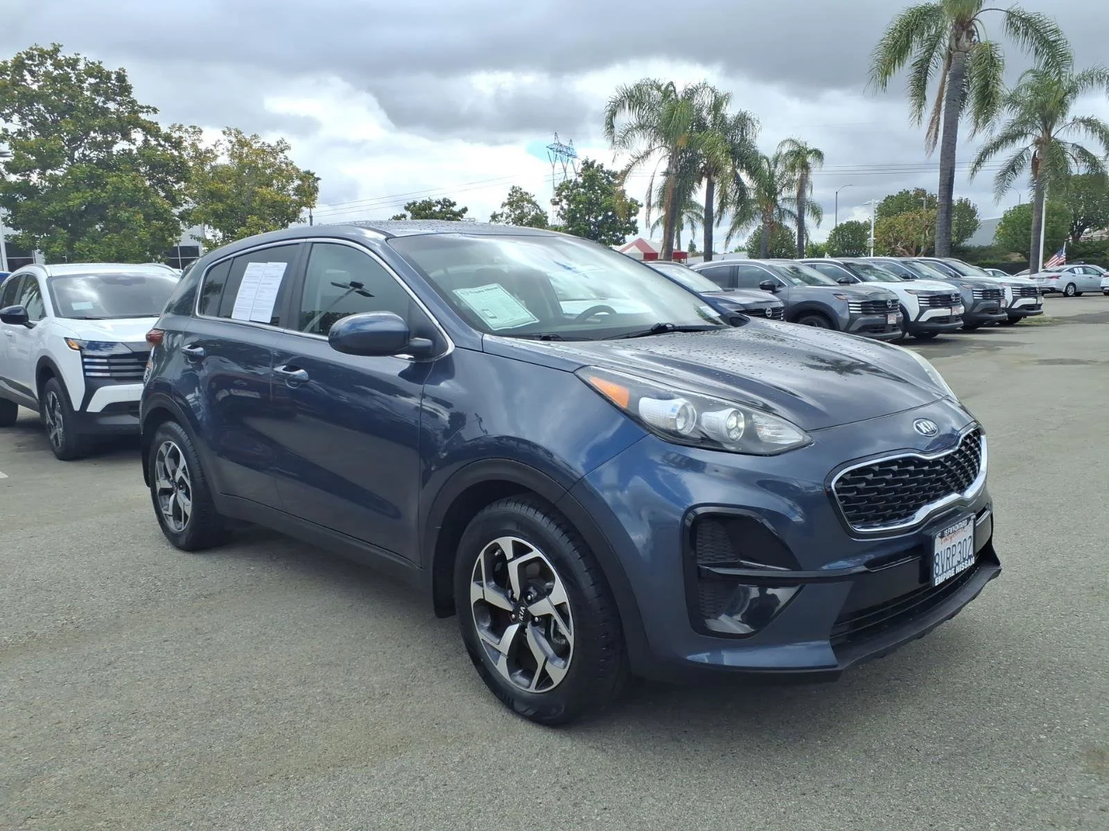Used 2021 Pacific Blue Kia LX image 4