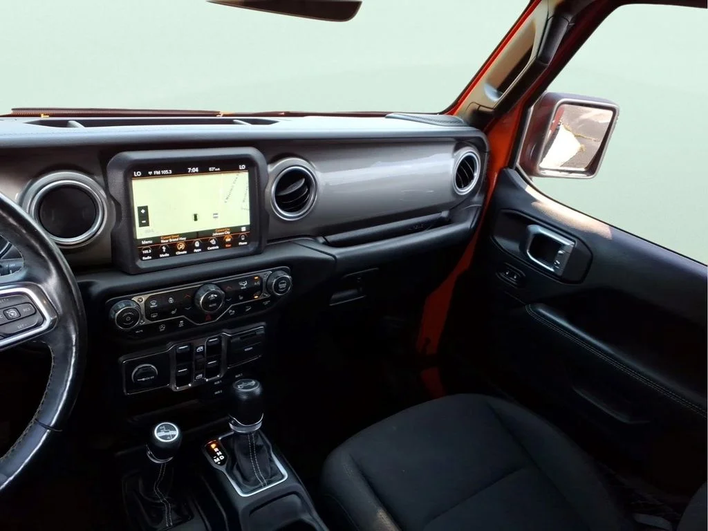 Used 2018 Orange Jeep Unlimited Sahara image 14