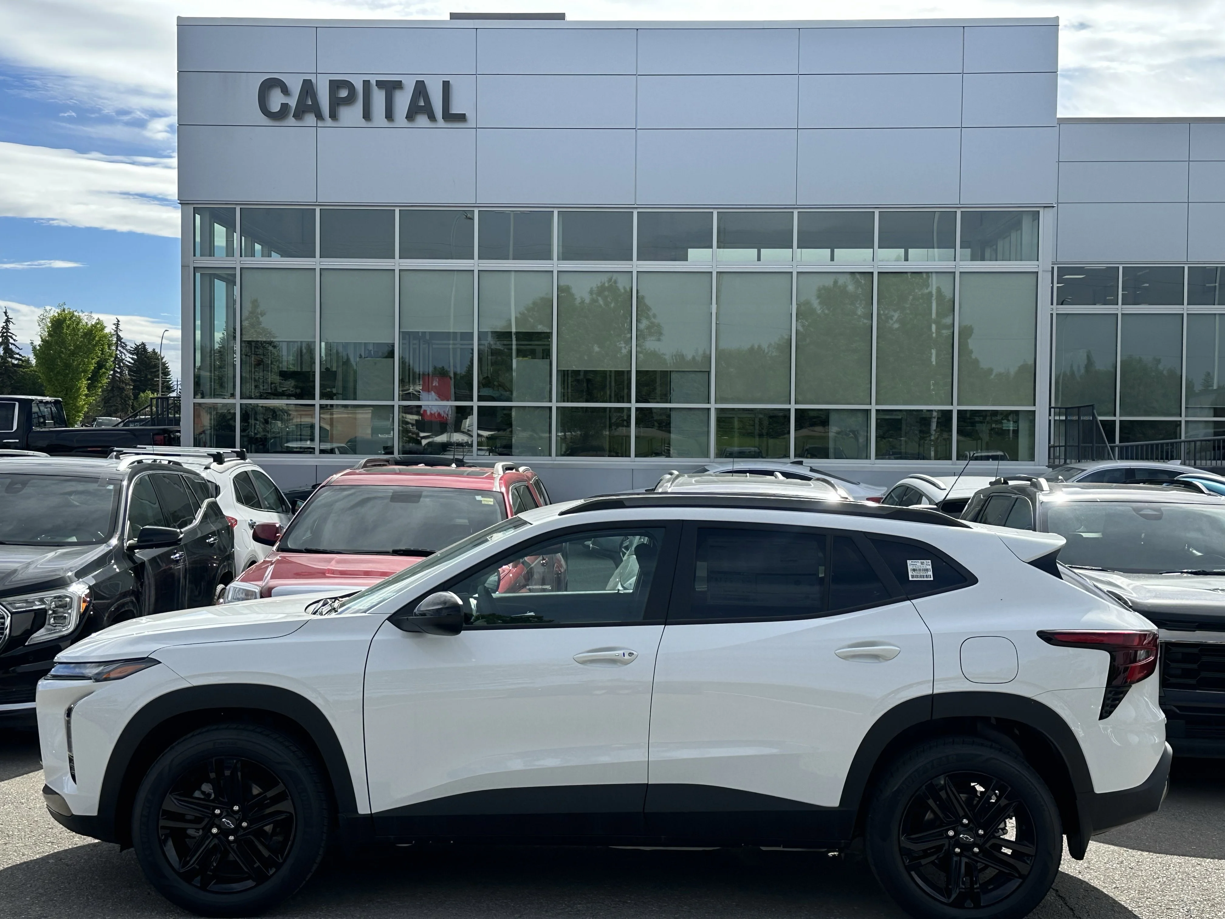 New 2026 Summit White Chevrolet ACTIV image 2