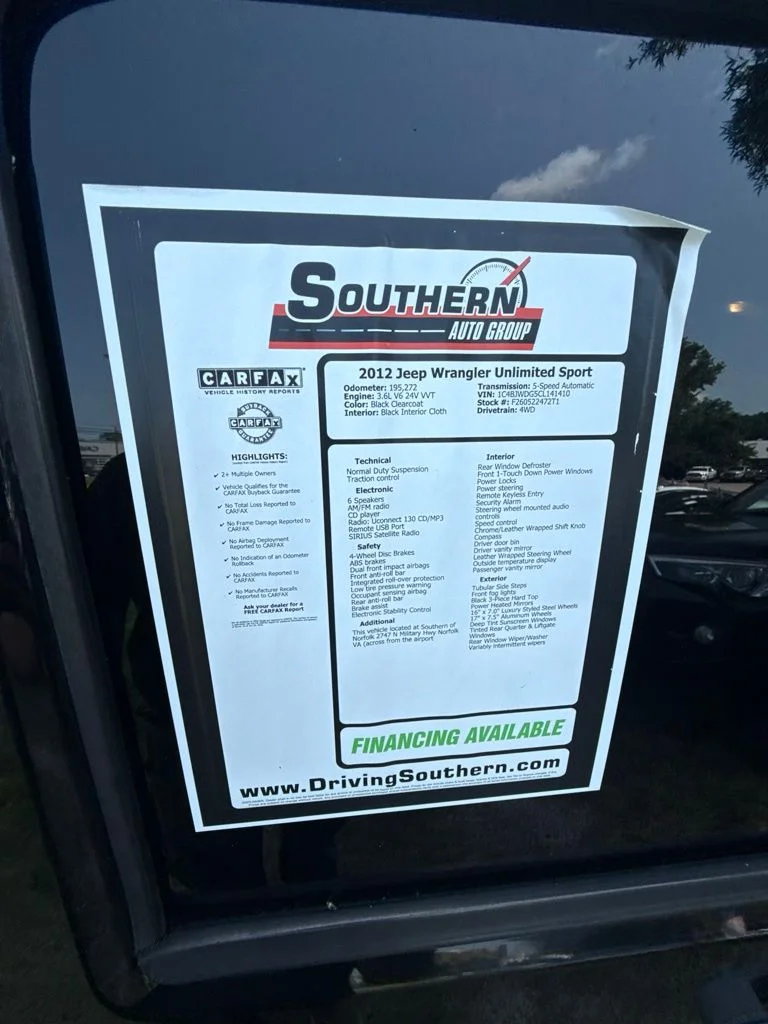 Used 2012 Black Jeep Unlimited Sport image 11