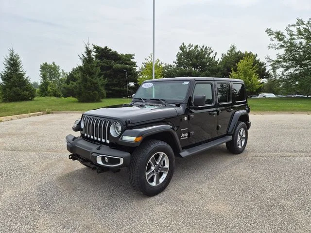 Used 2021 Black Jeep Unlimited Sahara image 1